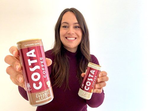 Maja Posing With Costa Coffee Cans